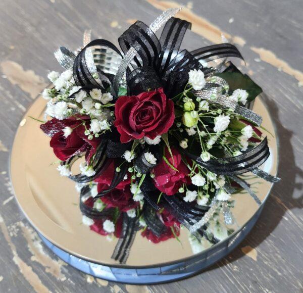 red and black corsage