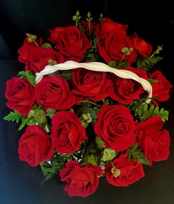 silk red roses in a white basket