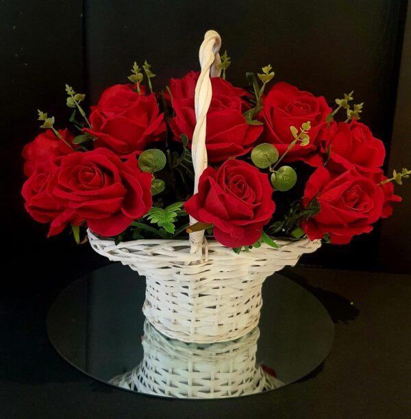 silk red roses in a white basket